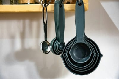 Copper measuring cups stamped 250 mL